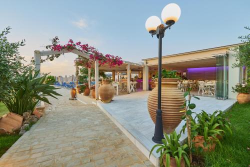 Restaurant, Golden Bay Hotel Apartments near Dolphin Beach Bar