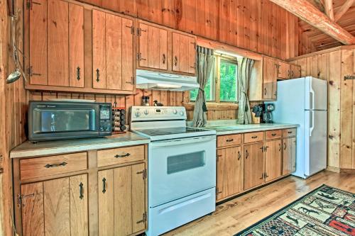 Cozy Lakefront Cabin with Dock Canoe and 2-Story Deck - image 2