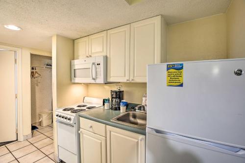 Beach Condo with Balcony and Pool Steps to Shore - image 6