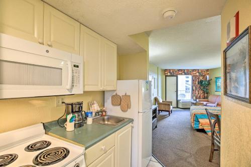 Beach Condo with Balcony and Pool Steps to Shore - image 7