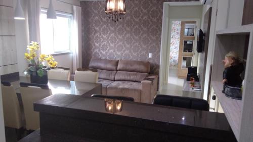lindo apartamento na praia de palmas