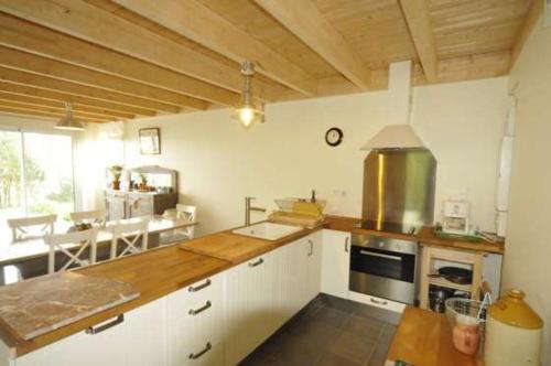 virtuve, Un Jardin en Pente Douce in Locquenole