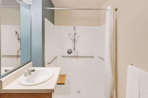 Bathroom, WoodSpring Suites Council Bluffs, an Extended Stay Hotel in Council Bluffs (IA)