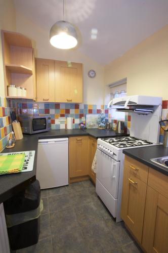 ห้องครัว, Saltburn Holidays Primrose Cottage in กริสโบโร่