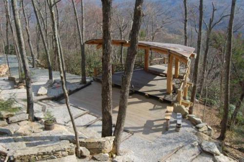2 BR Cabin with Hot Tub Deck Fire Pl - image 8