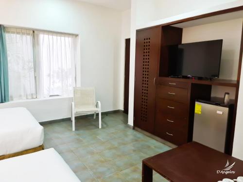 Dangelos Hotel on Fifth Avenue Stop at Dangelos 5ta. Avenida Hotel to discover the wonders of Playa Del Carmen. Offering a variety of facilities and services, the hotel provides all you need for a good nights sleep. Airport trans