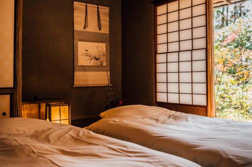 Ryokan Inn Yoshida-sanso Ryokan Inn Yoshida-sanso is conveniently located in the popular Higashiyama area. Both business travelers and tourists can enjoy the hotels facilities and services. All the necessary facilities, incl