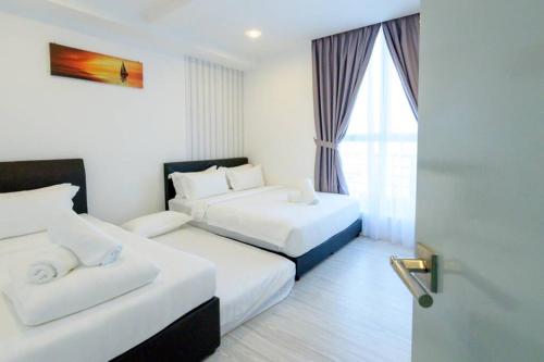 Sutera Avenue KK infinity pool top floor 10 mins to Airport 10 mins to Jetty