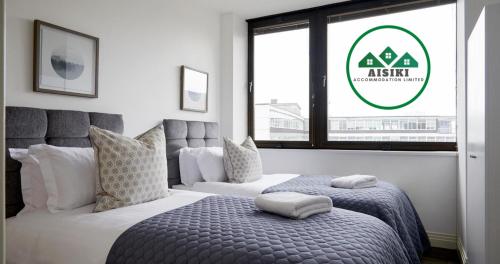 Aisiki Living at Upton Road, Multiple 1, 2, or 3-Bedroom Apartments, King or Twin Beds with Free Wi-Fi & Parking Space