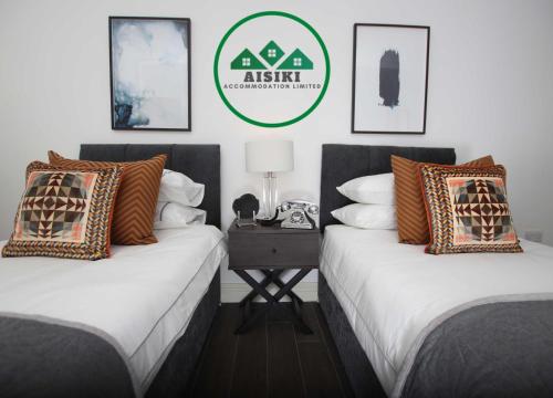 Aisiki Living at Upton Rd, Multiple 1, 2, or 3 Bedroom Apartments, King or Twin beds with FREE WIFI and PARKING