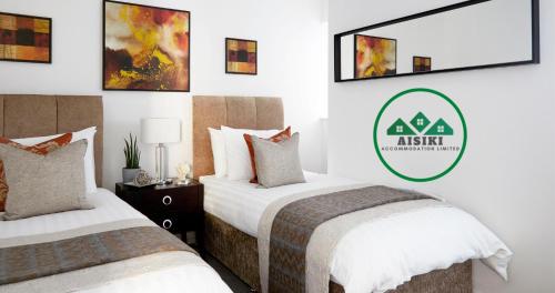 Aisiki Living at Upton Rd, Multiple 1, 2, or 3 Bedroom Apartments, King or Twin beds with FREE WIFI and PARKING