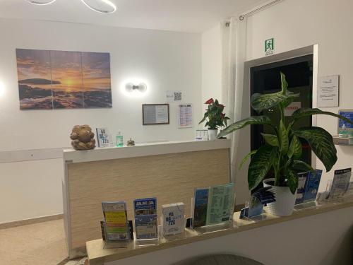 Фойє, Hotel Aurora in Варацце