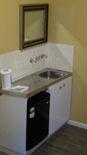 Kitchen, Central Private Hotel in Central