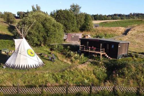 Tiny House mit Indianerzelt und Lagerfeuer im Harz - Apartment - Benneckenstein