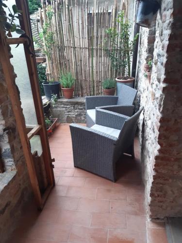 Attic with balcony at Locanda del Capo