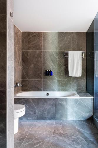 Suite with Balcony and Square View room in Radisson Blu Hotel Madrid Prado