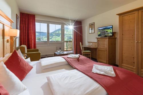 Hotel Harfenwirt - Tap to explore photos