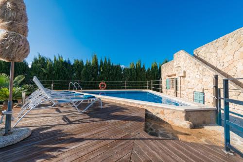 Villa Can Pau pool and garden close to the beach - main image
