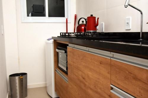 Kitchen, Residencial Santinho Beach in Santinho Beach