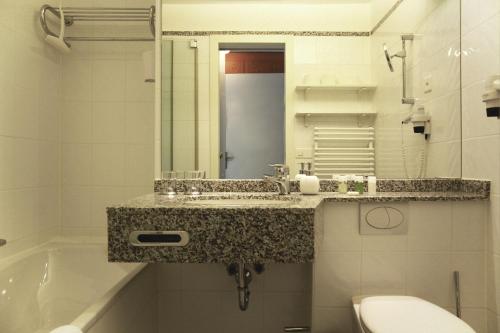 ห้องน้ำ, Apartment Enzian mit Mitbenutzung SPA & Wellness - GRIWA RENT AG in บีเทนแบร์ก