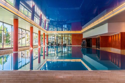 สระว่ายน้ำ, Apartment Enzian mit Mitbenutzung SPA & Wellness - GRIWA RENT AG in บีเทนแบร์ก