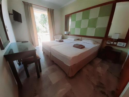 Chambre double avec 1 ou 2 lits, vue sur le jardin