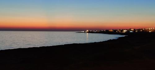 Sunset Bay – Torre Suda, OK