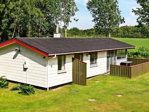 . 4 person holiday home in L s