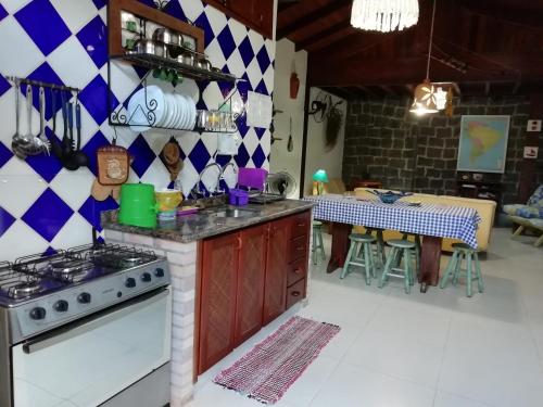 Közös társalgó / TV, Villa Félix Suites e Chalés (Villa Felix Suites e Chales) in Praia do Prumirim