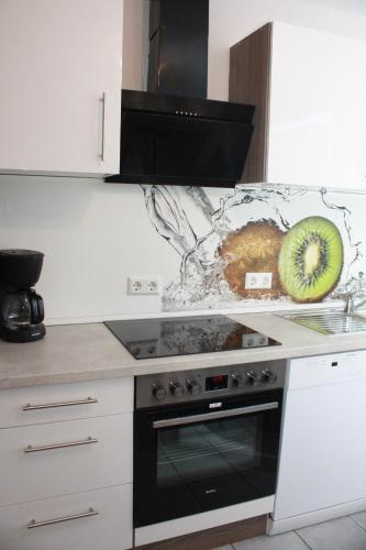 주방, Ferienwohnung Mülheim Heißen mit großem Balkon (Ferienwohnung Mulheim Heißen mit großem Balkon) in 겔센키르첸 시티 센터