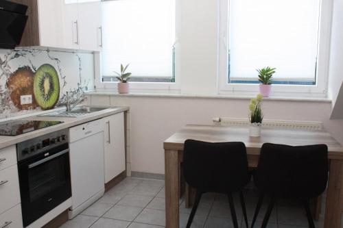 주방, Ferienwohnung Mülheim Heißen mit großem Balkon (Ferienwohnung Mulheim Heißen mit großem Balkon) in 겔센키르첸 시티 센터