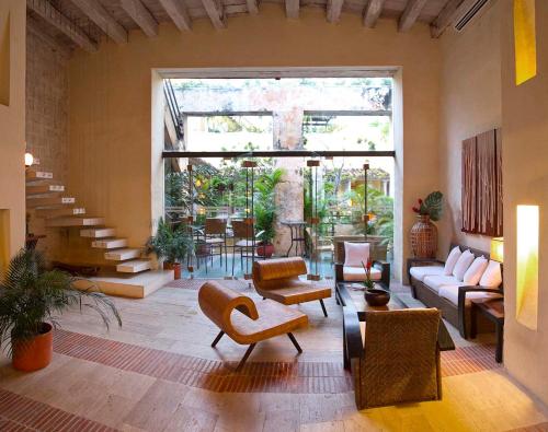 Casa Pombo Set in a prime location of Cartagena, Casa Pombo puts everything the city has to offer just outside your doorstep. Featuring a complete list of amenities, guests will find their stay at the property a
