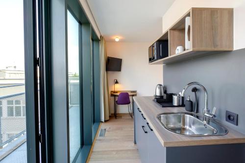 Go Hotel City Apartments - image 2