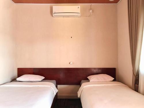Penginapan Intan Bandara Room Type - Standard Twin Room