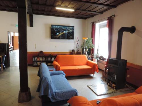 صالة مشتركة/ منطقة التلفزيون, HAUS RINGGAU - Urlaub, Gemeinschaft und Erlebnis im Herzen von Deutschland in Herleshausen