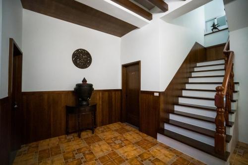 Shared lounge/TV area, Ryan's Guesthouse in Xiyu Township