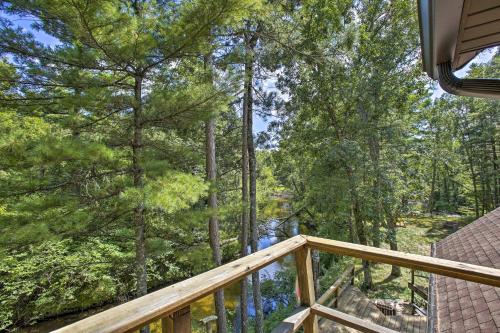 Rustic Riverside Retreat with Wraparound Deck! - image 12
