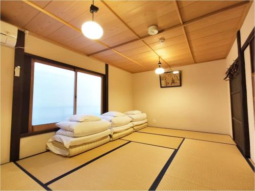 Quadruple Room with Shared Bathroom