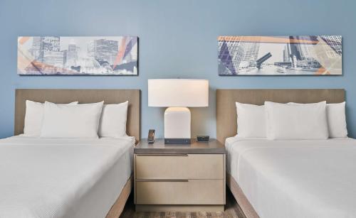 Den Guestroom with Two Queen Beds room in Hyatt House Chicago Medical/University District