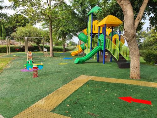 Parque infantil, Boutique Apartments Caesarea in Caesarea
