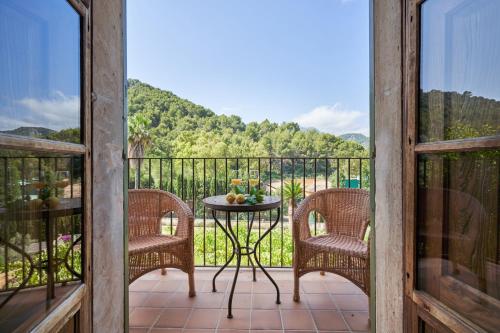 ระเบียง/ชานเรือน, Hotel Es Port in ปอร์ต เด ซอเยอร์