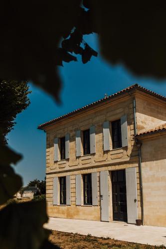 Chambre du Château Le Conte au coeur du vignoble de Saint Emilion chambre d'hôte Saint-Laurent-des-Combes