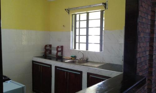 Kjøkken, Hilda Blooms in Kisumu