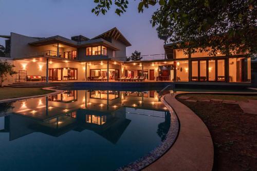 Jay House by StayVista - Leisure oasis with pool, snooker, table tennis & foosball fun, Alibag