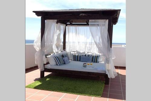  ATICO en la PLAYA con PISCINA y GOLF in Torre de Benagalbón