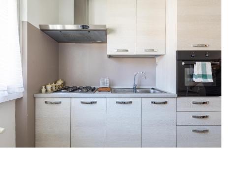 Cocina, ENJOY VARENNA CASA VACANZE in Varenna