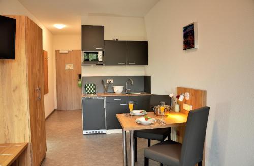 廚房, Motel am Fürfelder Schloss (Motel am Furfelder Schloss) in 巴特拉珀瑙