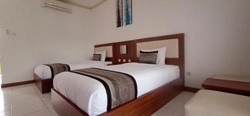 OYO 953 Family Beach Hotel Room Type - Standard Twin Room