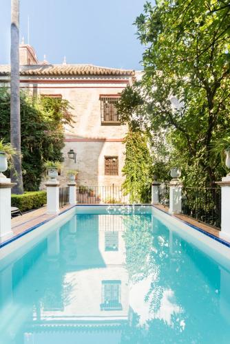Casa Elvira, house with swimming pool and gardens close to the Cathedral and Alcazar Palace gîte à louer Siviglia