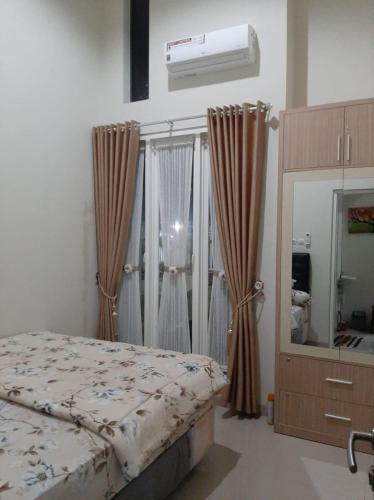 Villa Blossom Kayana Regency E7